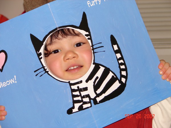 Looking through a cut out book! Photo