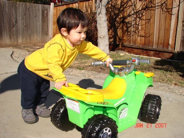 Riding his ATV Photo
