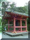 Junne ringing the bell - ringing the bell is said to be good luck before one enters the temple - click on pic for larger representation 