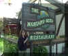 Junne standing in front of a restaurant we ate at the first night in town - Click on picture to see larger representation