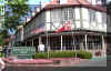 Bruce standing in front of Petersen Inn - Click on picture to see larger representation
